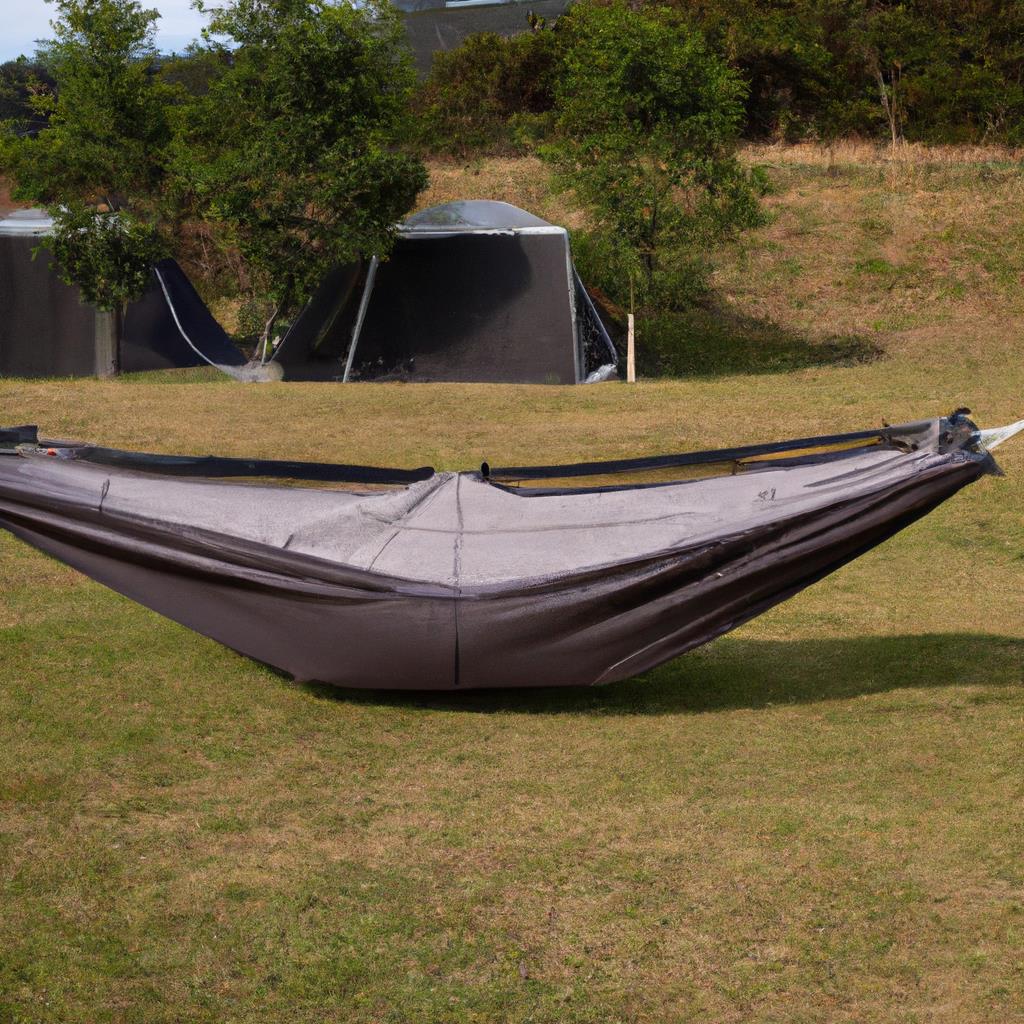 A cozy tent set up in a forest clearing, surrounded by tall trees and a crackling campfire. A camping site with a picnic table and a view of the mountains. Nature and adventure await at this secluded getaway.